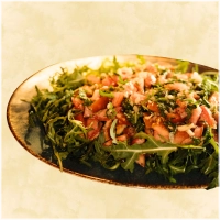 Geroosterd brood met gekruide tomaten, verse knoflook en olijfolie